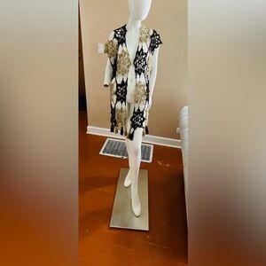 Handmade crochet beach cover up, one size only, color brown.